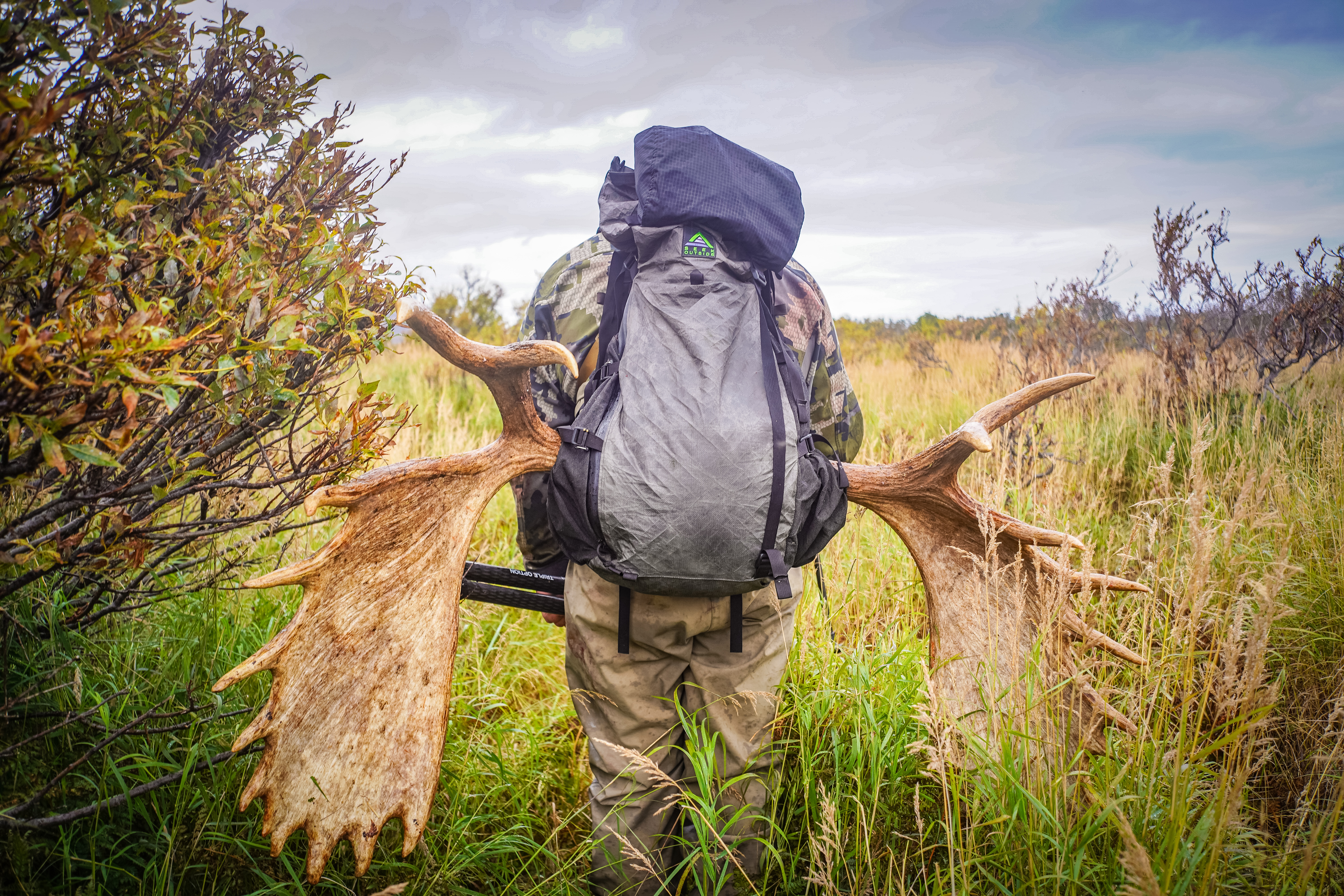 Goshawk 6300 backpack being used to haul out a moose by utilizing the breakaway function